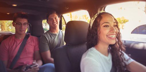 Woman driving two men