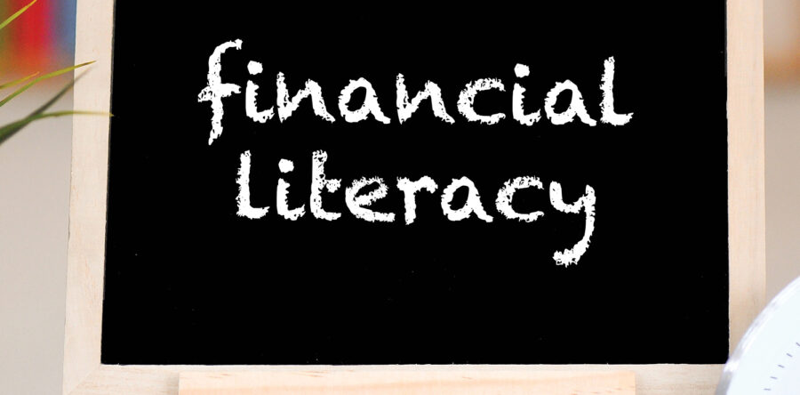 Chalkboard with Financial Literacy written on it