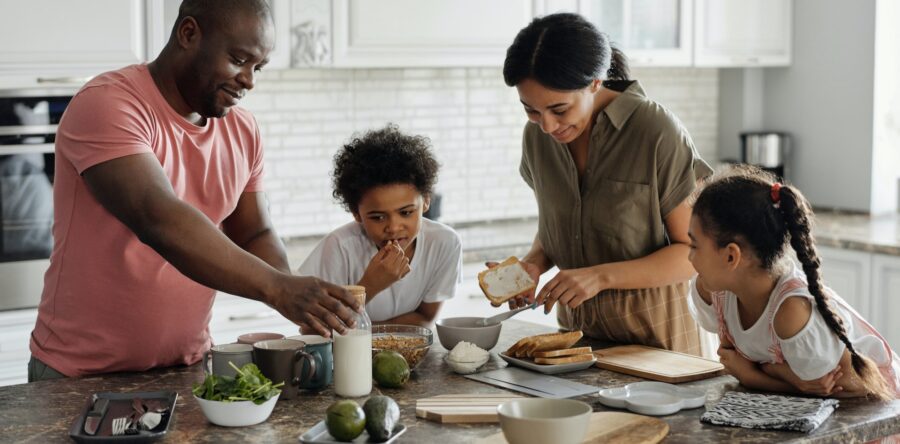 Family making a meal together