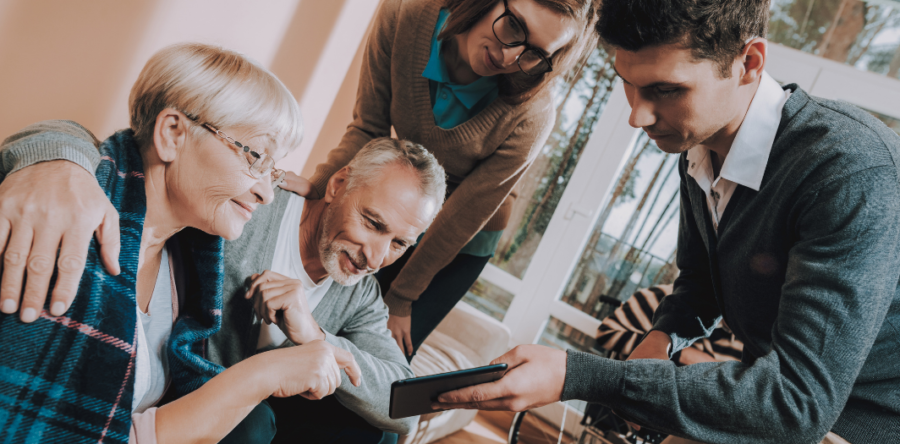 a family looking at something on a phone