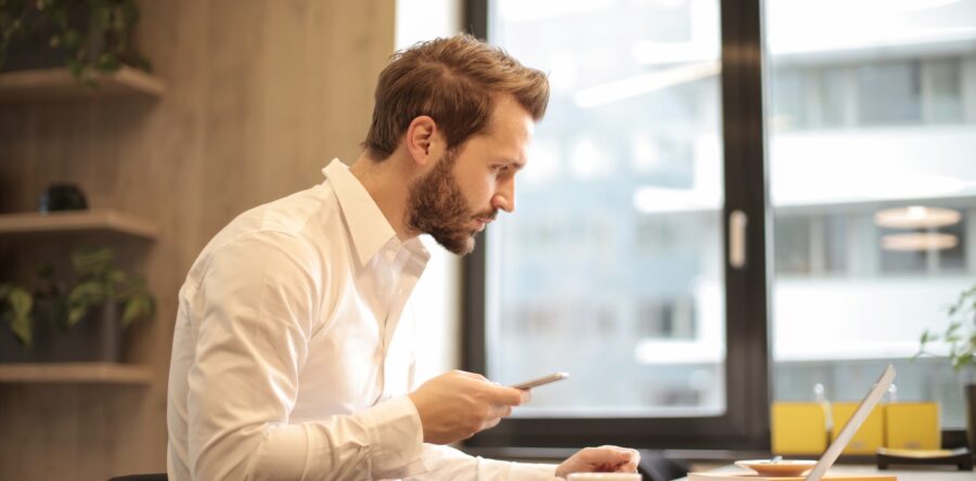 Man looking at his laptop very intently